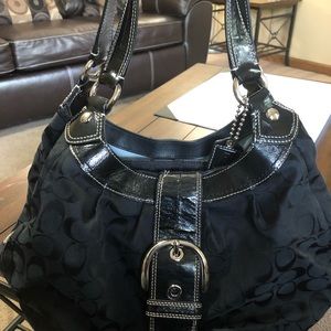 Coach medium black inside light blue